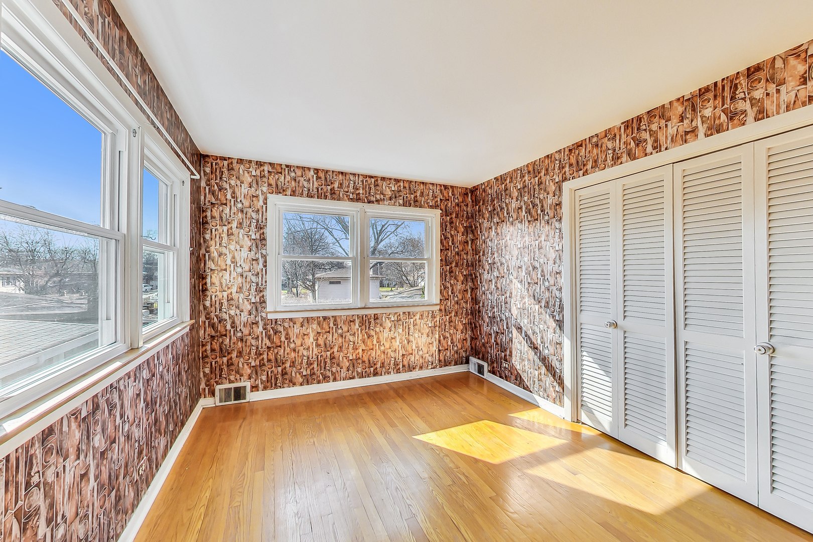 2101 Walnut Street Park Ridge, IL 60068 - Photo 24 of 37 a view of a big room with wooden floor and windows
