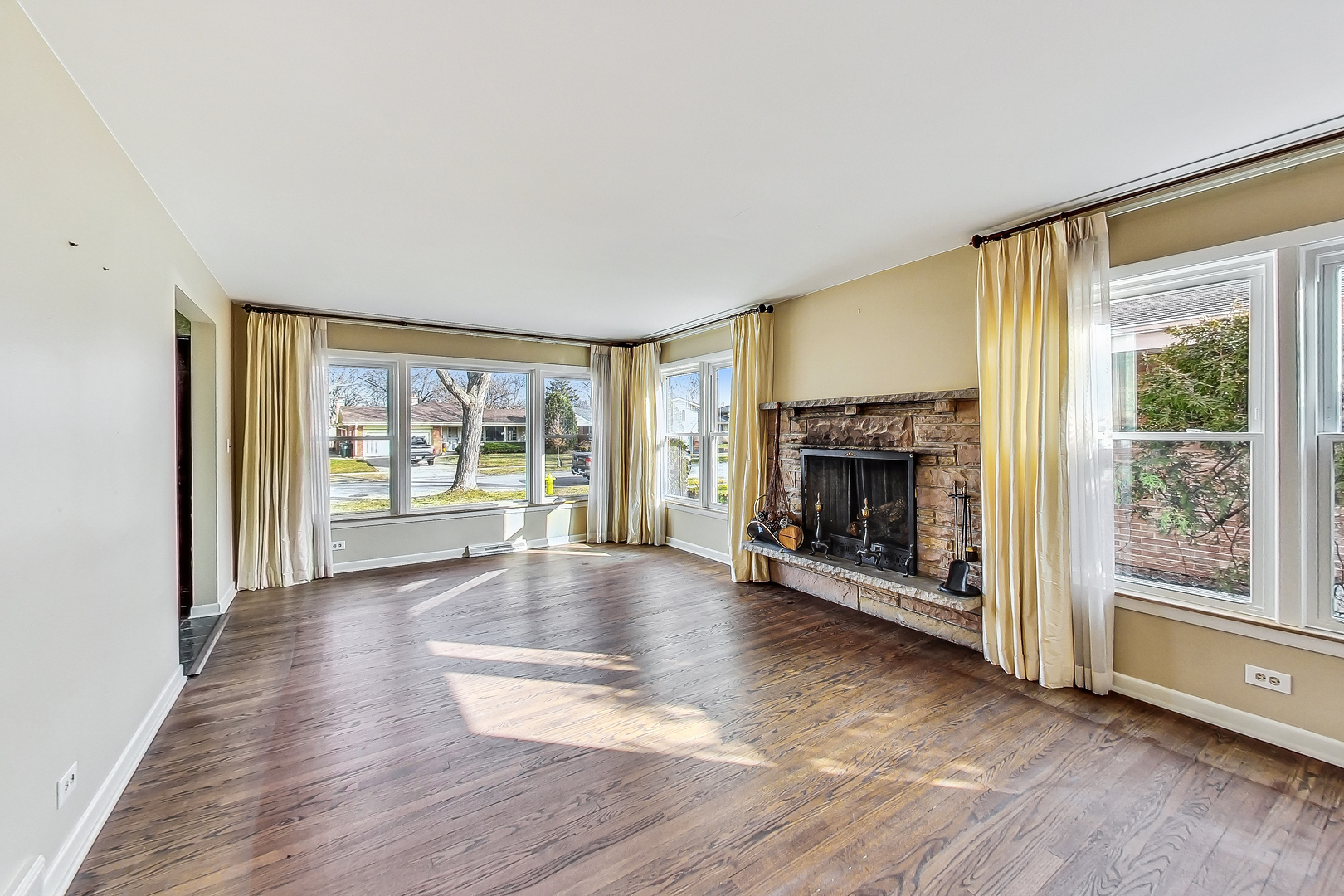 2101 Walnut Street Park Ridge, IL 60068 - Photo 5 of 37 wooden floor fireplace and windows in an empty room