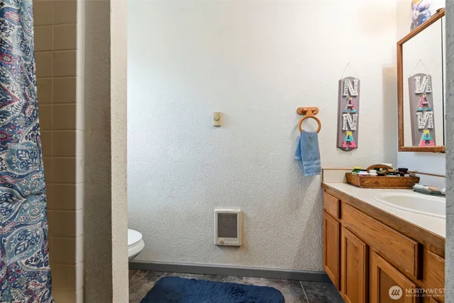a bathroom with a sink and a toilet