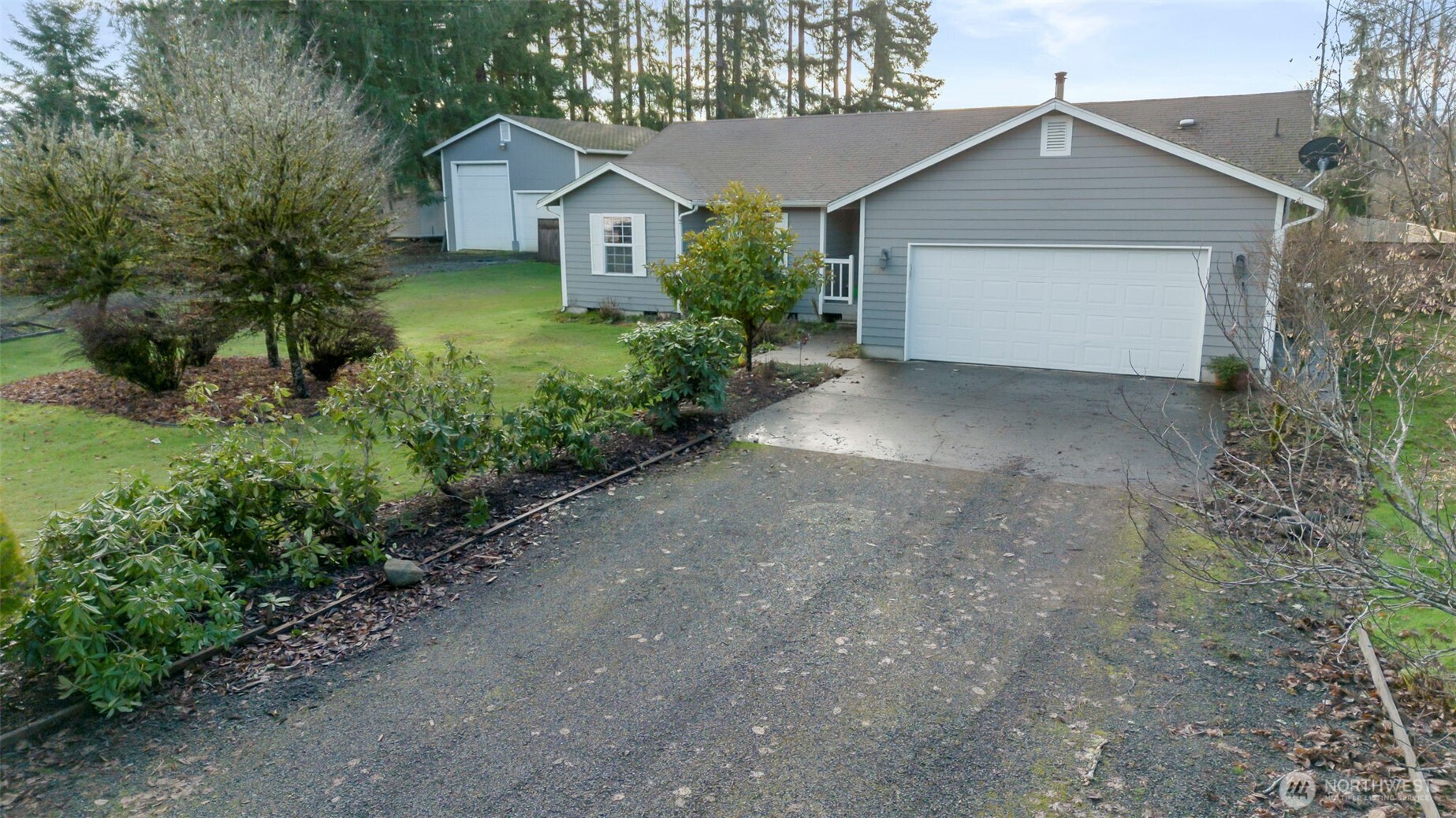 126 Bethany Lane Winlock, WA 98596 - Photo 37 of 37 a view of a house with a yard and garage