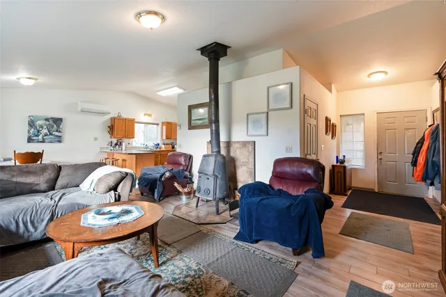 a living room with furniture and a coffee table
