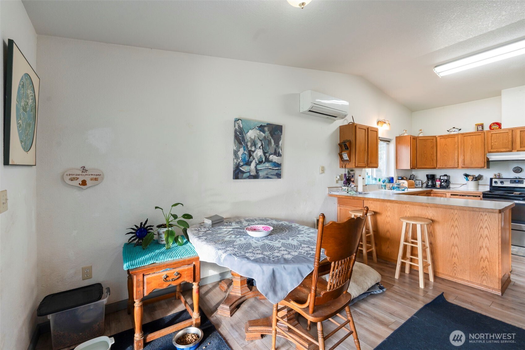 126 Bethany Lane Winlock, WA 98596 - Photo 6 of 37 a workspace with furniture and kitchen view