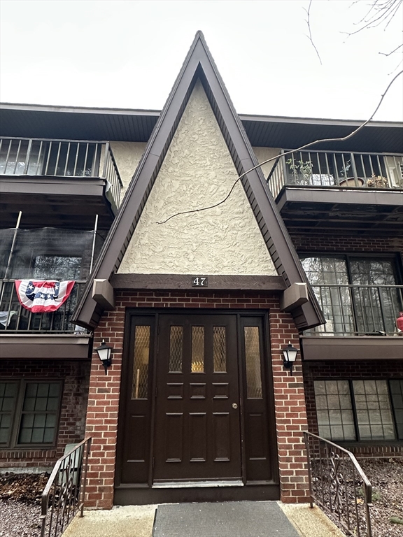 47 West Street, Unit C4 Randolph, MA 02368 - Photo 9 of 10 a view of building with an entryway and deck