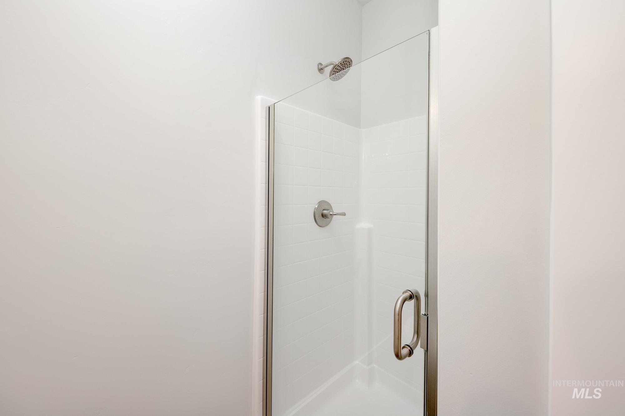 6447 South Sunfish Way Boise, ID 83709 - Photo 14 of 29 Full bath featuring a stall shower