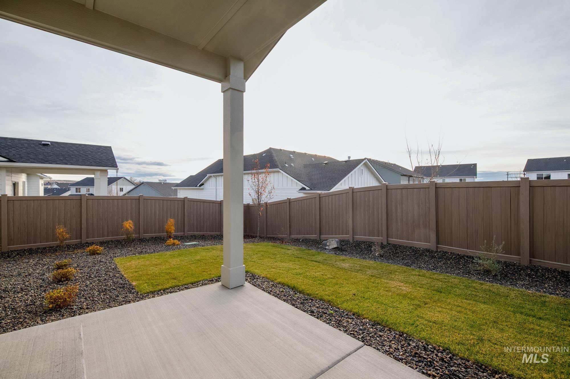 6447 South Sunfish Way Boise, ID 83709 - Photo 28 of 29 Fenced backyard with a patio