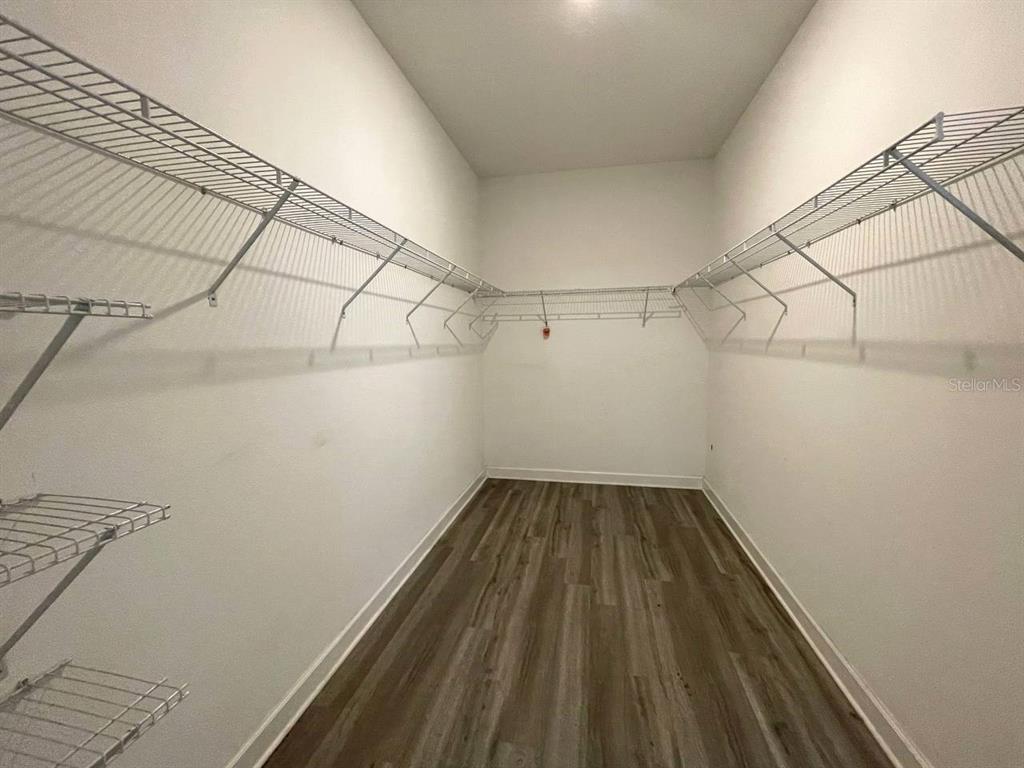 13339 Orca Sound Drive Riverview, FL 33579 - Photo 16 of 32 a view of a room with racks on the wall