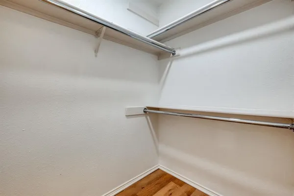 a view of a room with racks on the wall