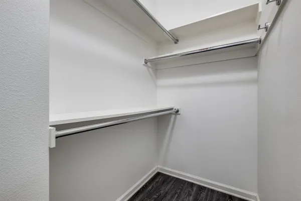 a view of an empty walk in closet
