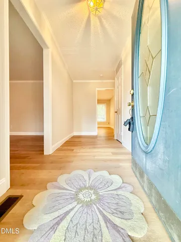 a view of a swimming pool and lounge chair
