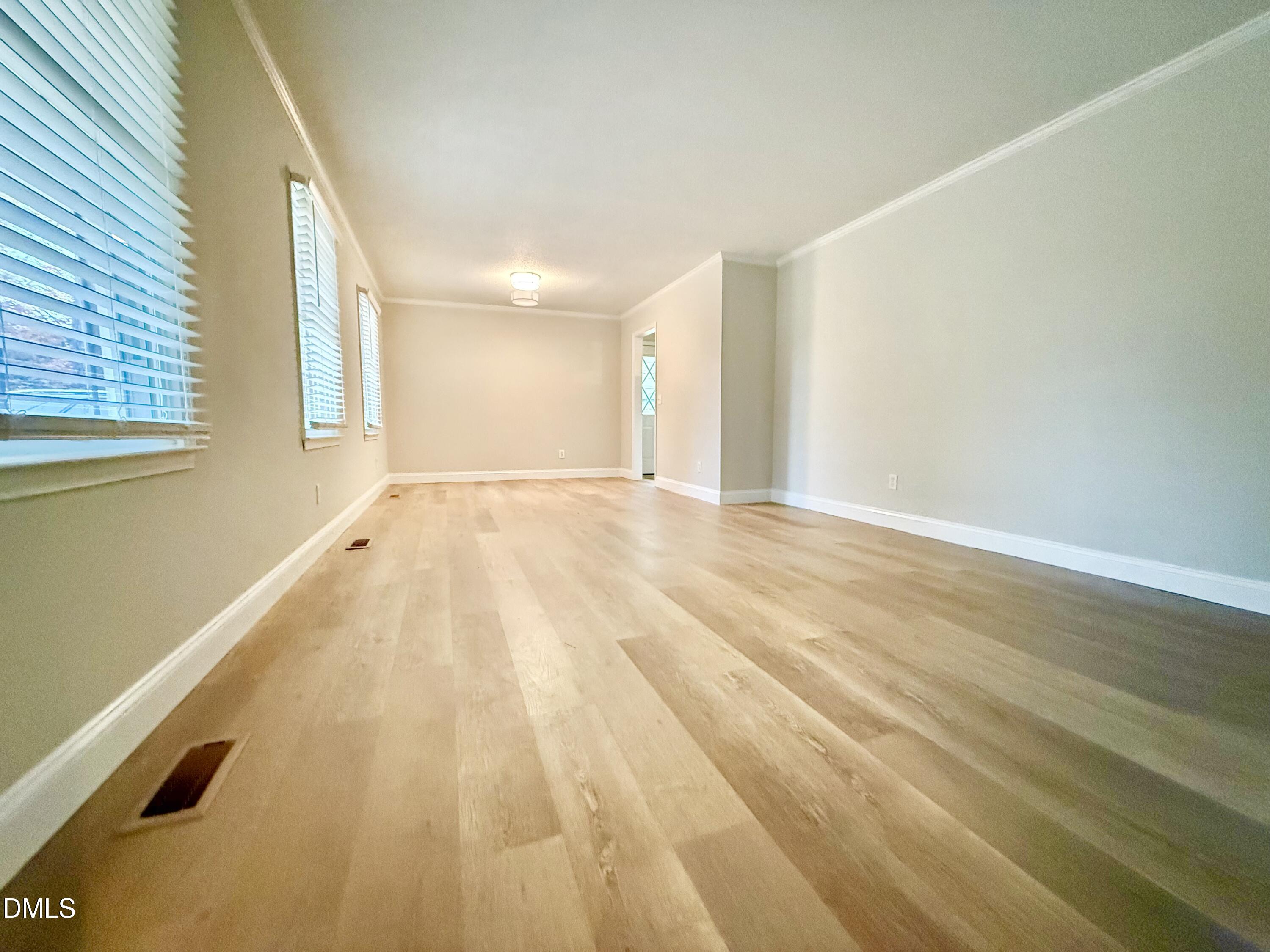 3517 Morningside Drive Raleigh, NC 27607 - Photo 6 of 14 a view of an empty room and window