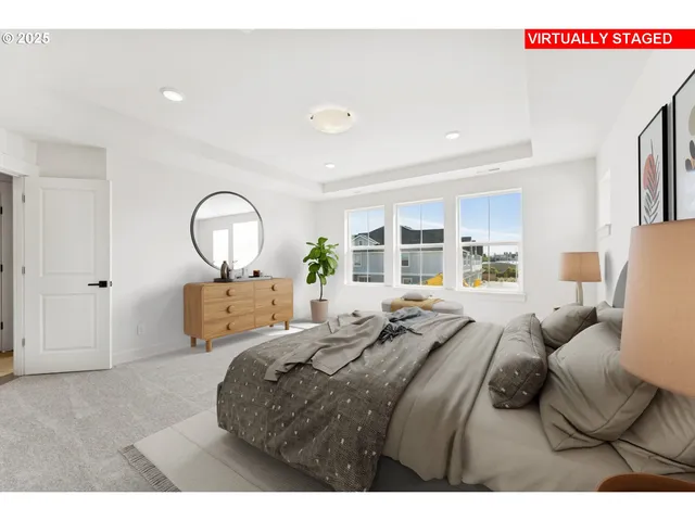 a bed room with a bed mirror and window