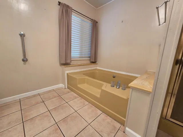 a bathroom with a bathtub