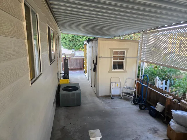 a room with window and furniture