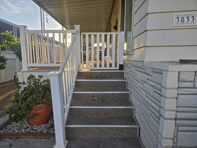a view of entryway with wooden floor and a potted plant
