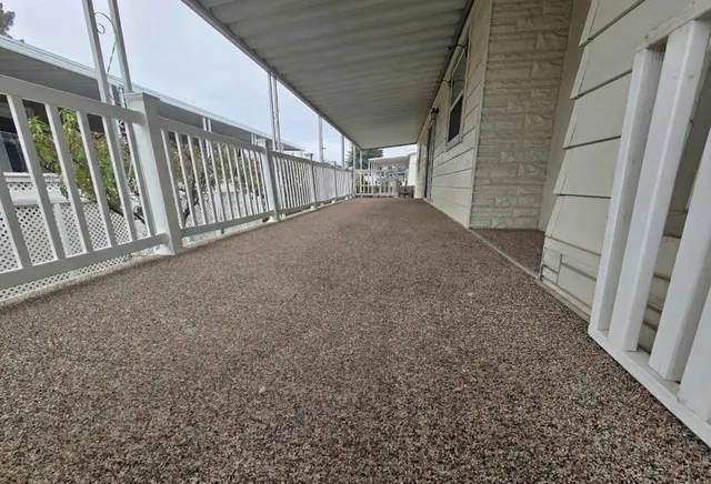 a view of backyard and porch