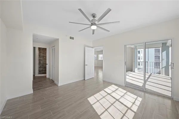 a view of an empty room and window