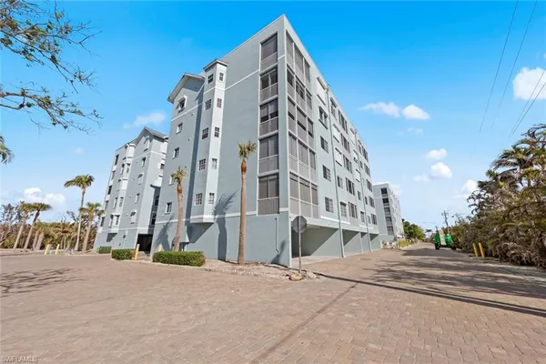 a view of a building with a street