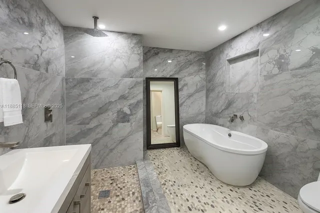 a bathroom with a sink and a bathtub