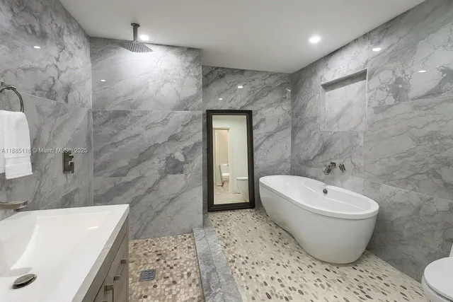 a bathroom with a sink and a bathtub