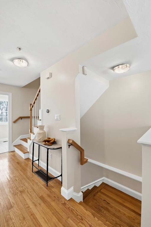 52 Packards Lane, Unit 4 Quincy, MA 02169 - Photo 14 of 40 a view of entryway with wooden floor