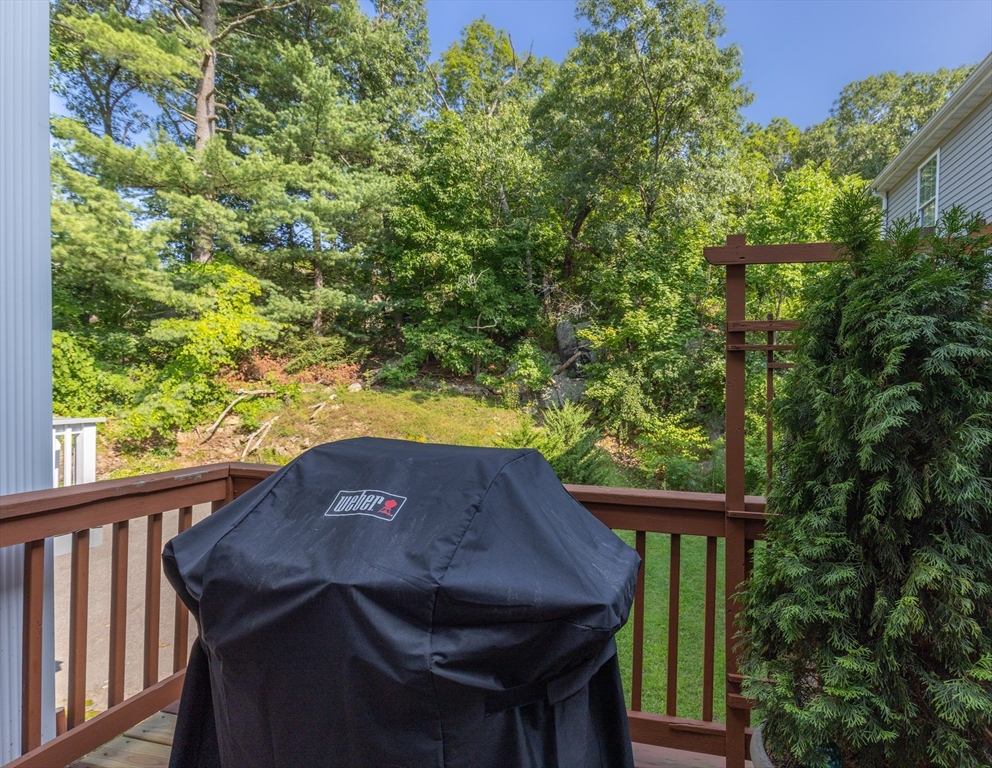 52 Packards Lane, Unit 4 Quincy, MA 02169 - Photo 34 of 40 a view of a balcony with an outdoor space