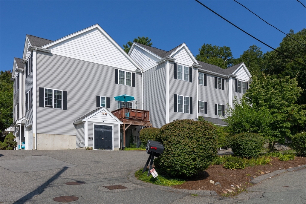 52 Packards Lane, Unit 4 Quincy, MA 02169 - Photo 35 of 40 front view of a house with a street