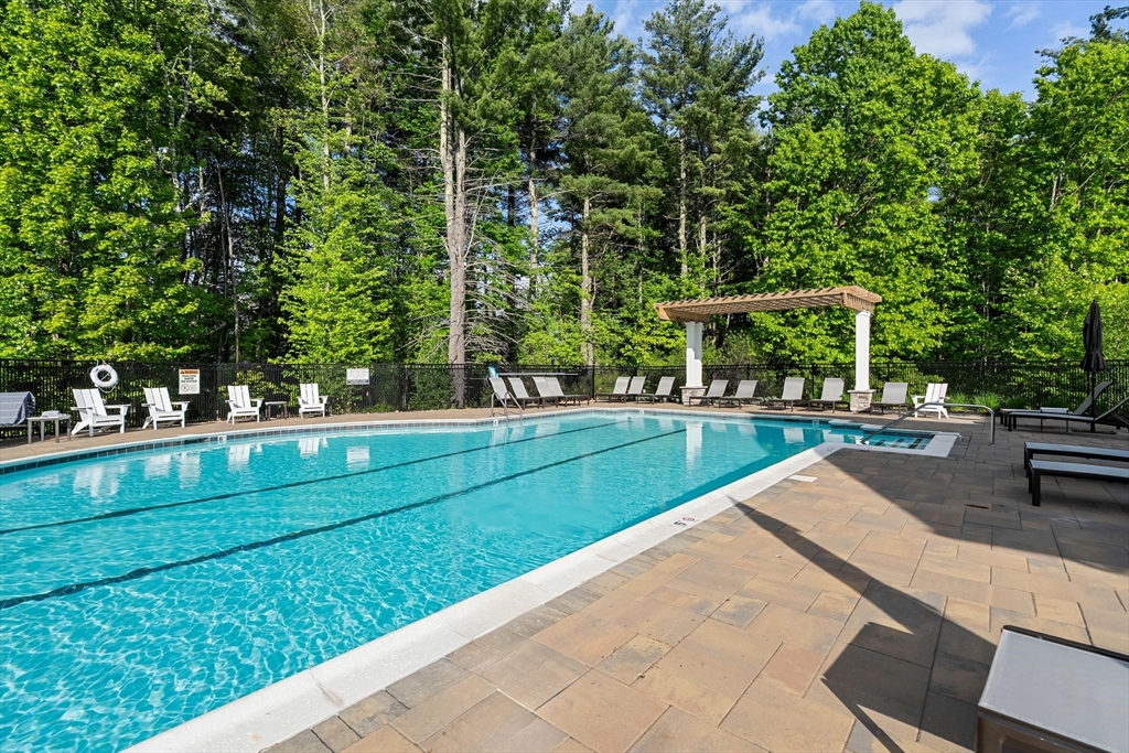 2 Hummingbird Way, Unit 1 Methuen, MA 01844 - Photo 40 of 42 a view of swimming pool with a yard