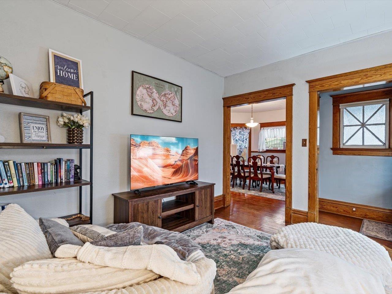 517 12th Street Dewitt, IA 52742 - Photo 16 of 40 a bedroom with furniture and a flat screen tv