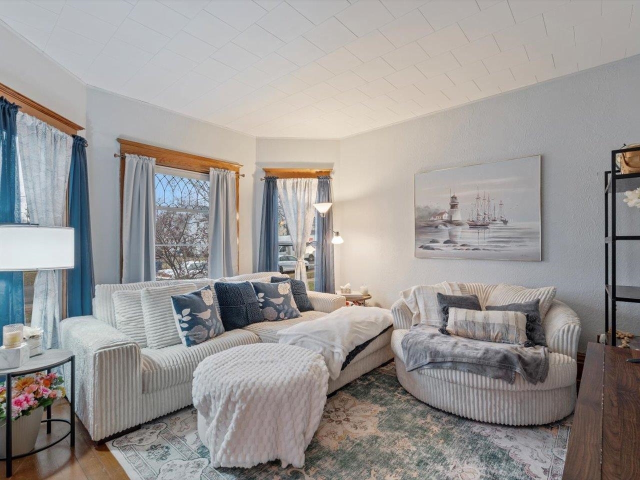 517 12th Street Dewitt, IA 52742 - Photo 17 of 40 a living room with furniture and a large window