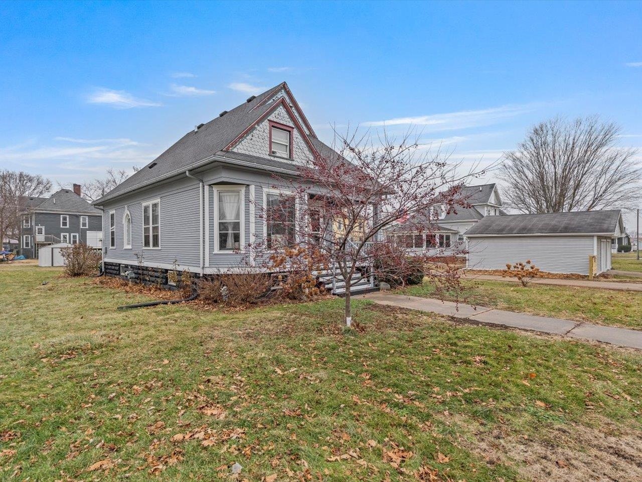 517 12th Street Dewitt, IA 52742 - Photo 2 of 40 a view of a house with a yard