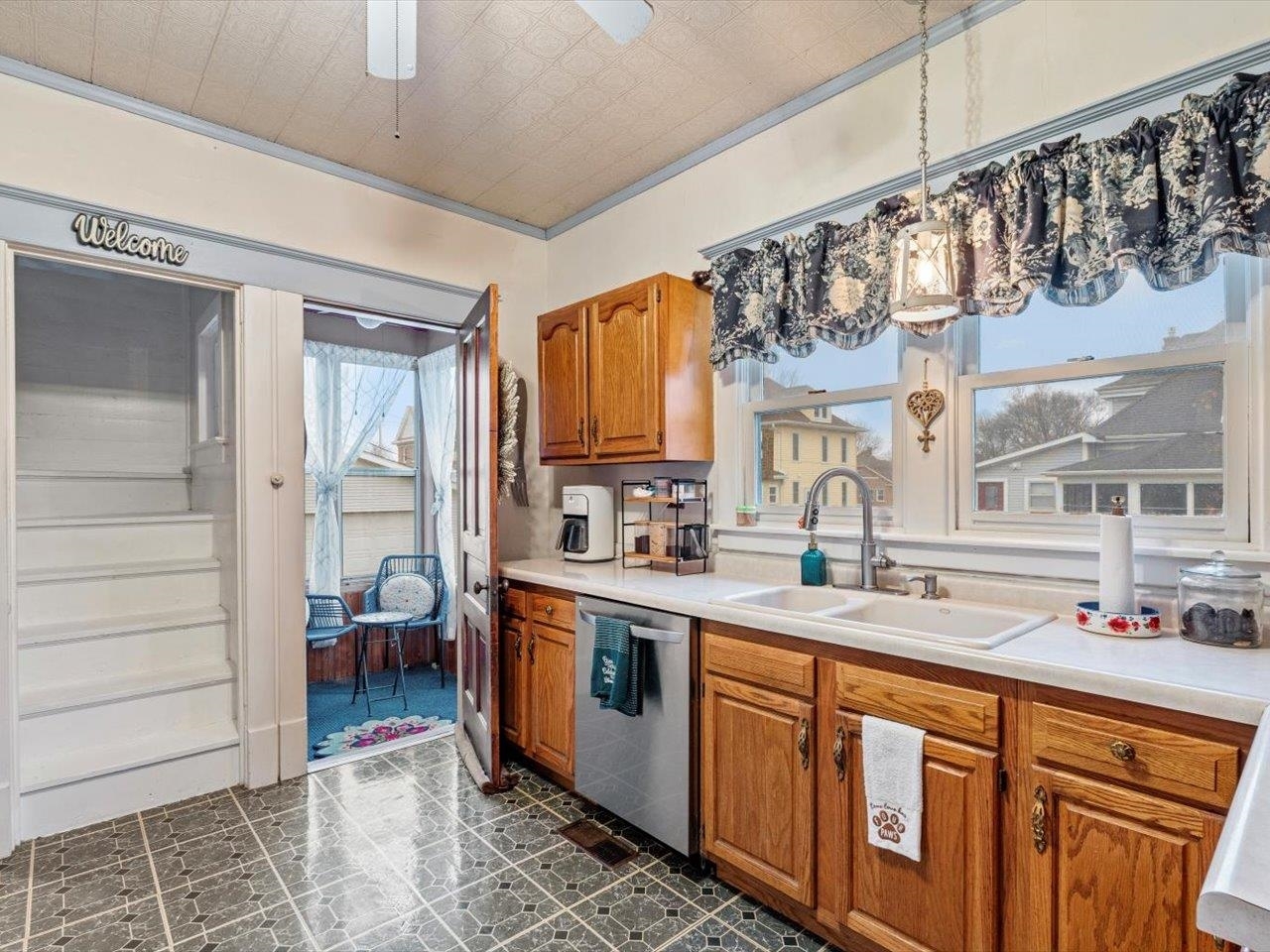 517 12th Street Dewitt, IA 52742 - Photo 22 of 40 a kitchen with stainless steel appliances granite countertop a sink and cabinets