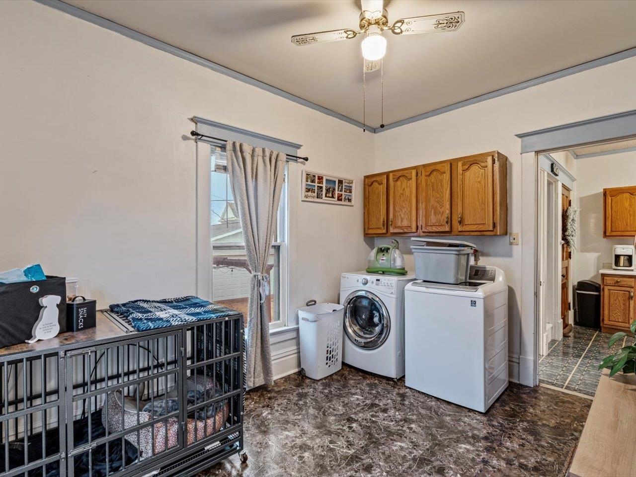 517 12th Street Dewitt, IA 52742 - Photo 24 of 40 a storage & utility room with a washer dryer