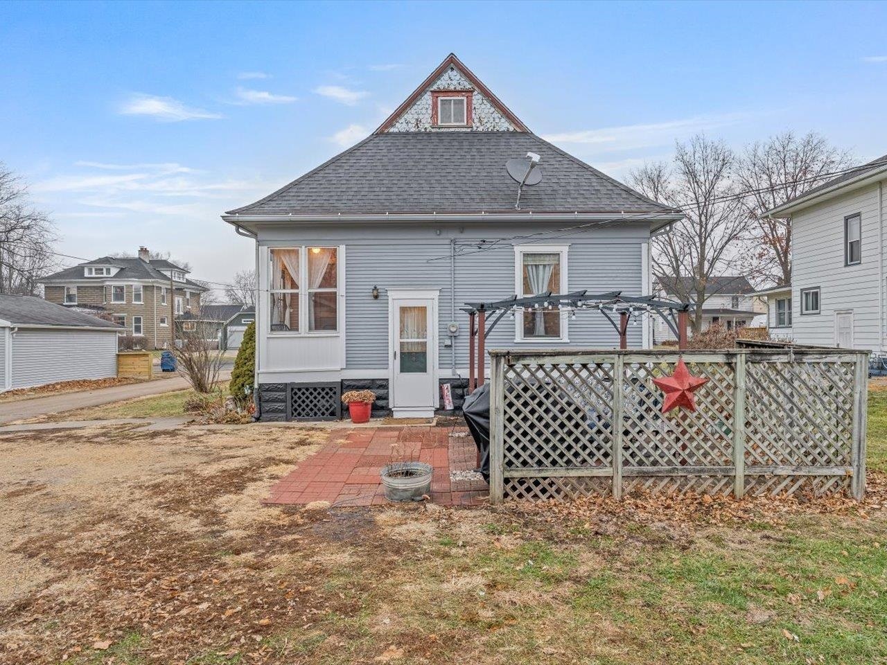 517 12th Street Dewitt, IA 52742 - Photo 8 of 40 a front view of a house with a yard