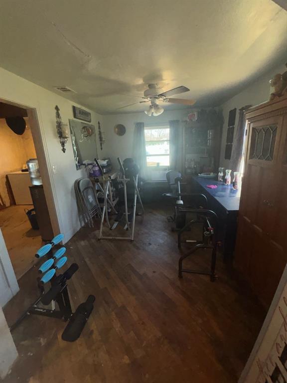 2102 North Grand Avenue Tyler, TX 75702 - Photo 5 of 13 Dining space with dark wood-type flooring and a ceiling fan