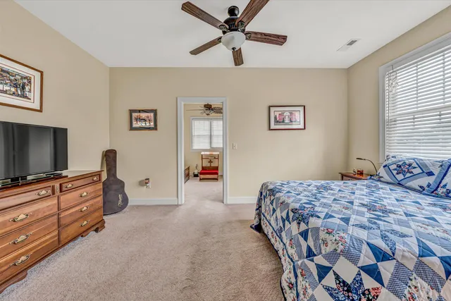 a room with chair and window