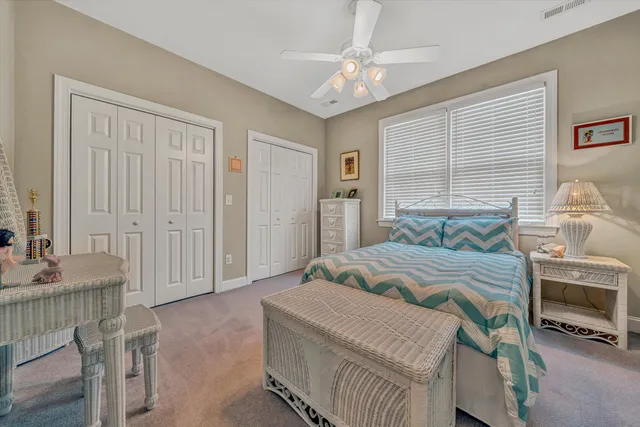 a view of a garage with rack and bicycle