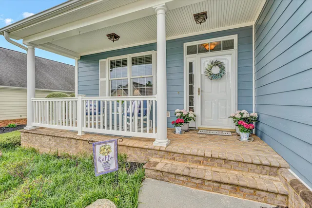 a front view of a house with a porch