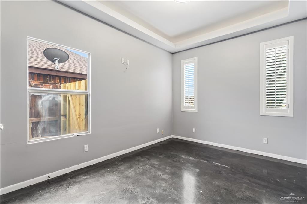 1342 Patsy Cline Drive Edinburg, TX 78541 - Photo 15 of 18 a view of an empty room with a window