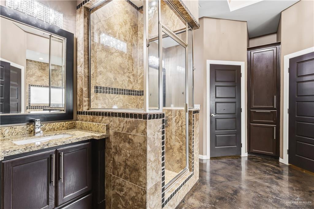 1342 Patsy Cline Drive Edinburg, TX 78541 - Photo 9 of 18 a bathroom with a granite countertop shower and a sink