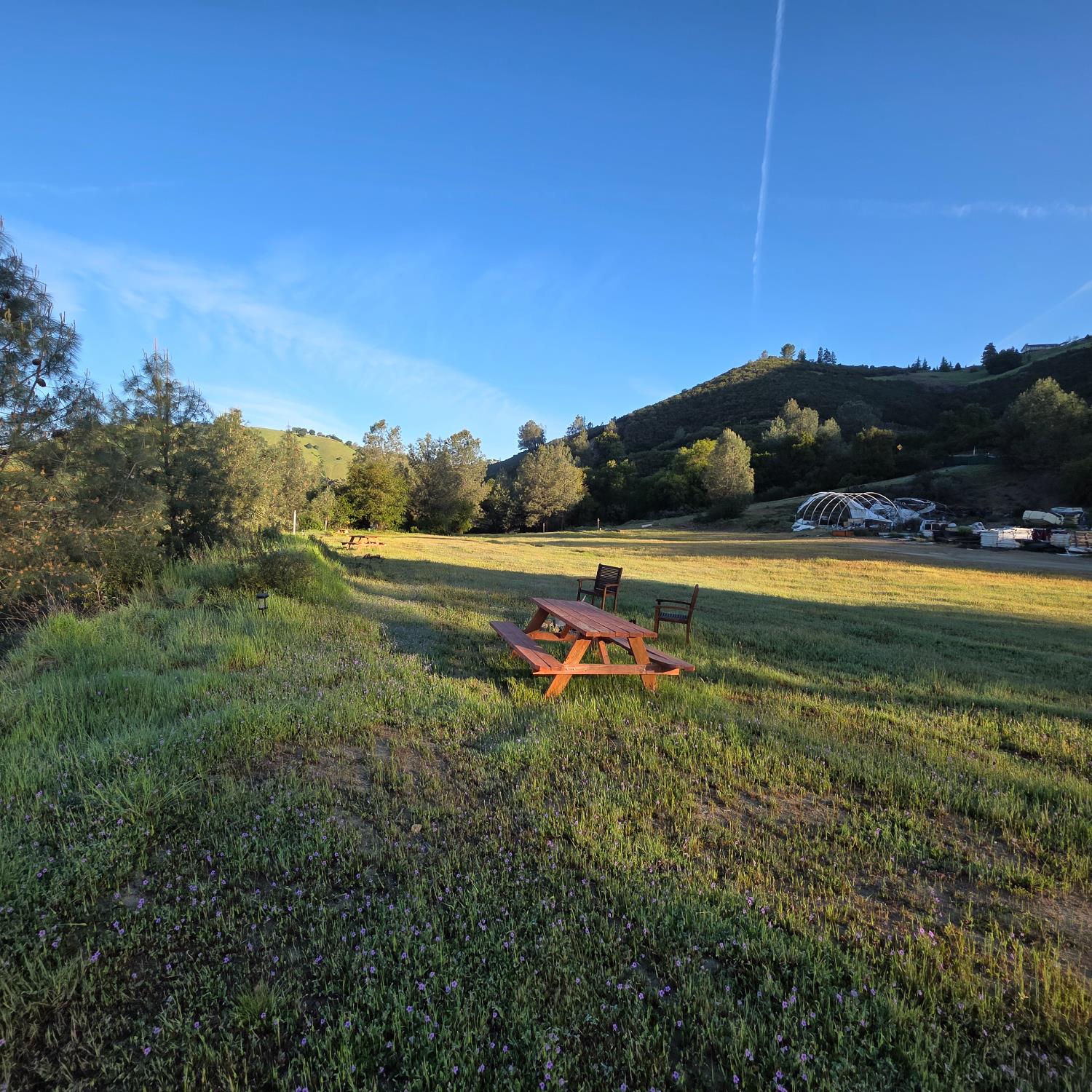 6600 Marshall Road Lotus, CA 95651 - Photo 19 of 32 a view of a lake with sunset in the background