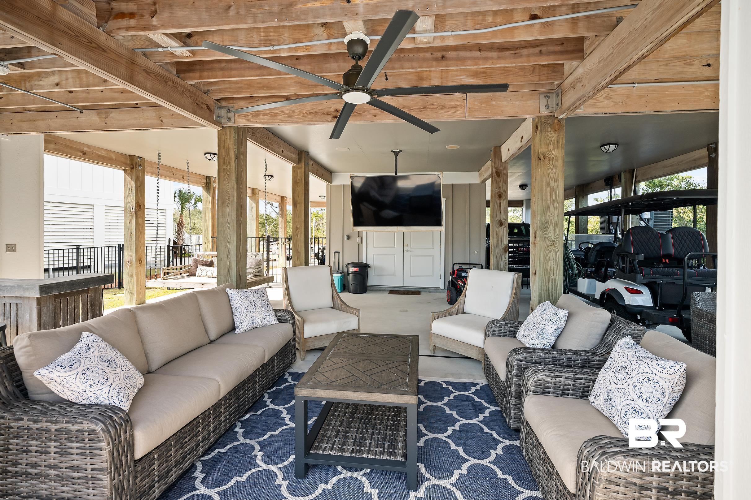33186 Marlin Key Drive Orange Beach, AL 36561 - Photo 76 of 87 View of patio / terrace with ceiling fan and an outdoor living space