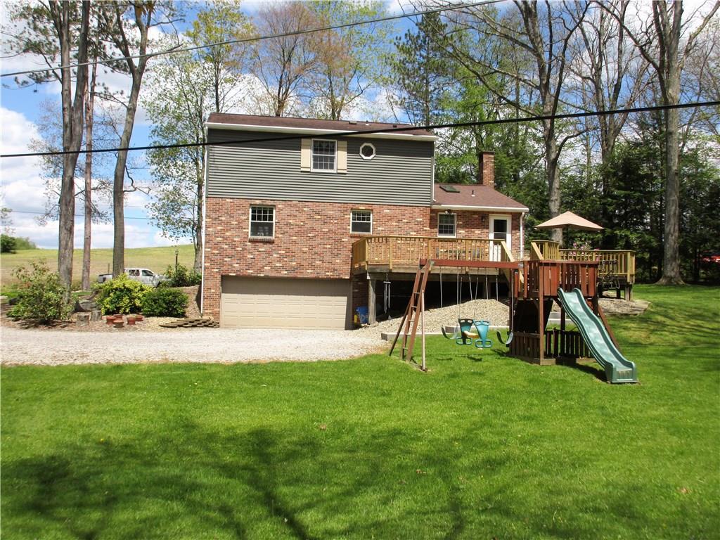 244 Harbison Road Sarver, PA 16055 - Photo 23 of 25 View of back of home. Large driveway leads to 2-car integral garage.