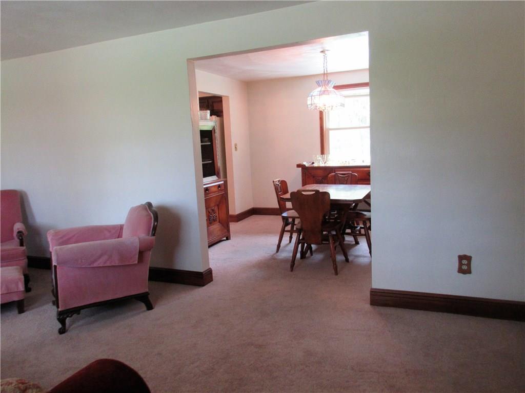 244 Harbison Road Sarver, PA 16055 - Photo 6 of 25 Living room leads into dining room.