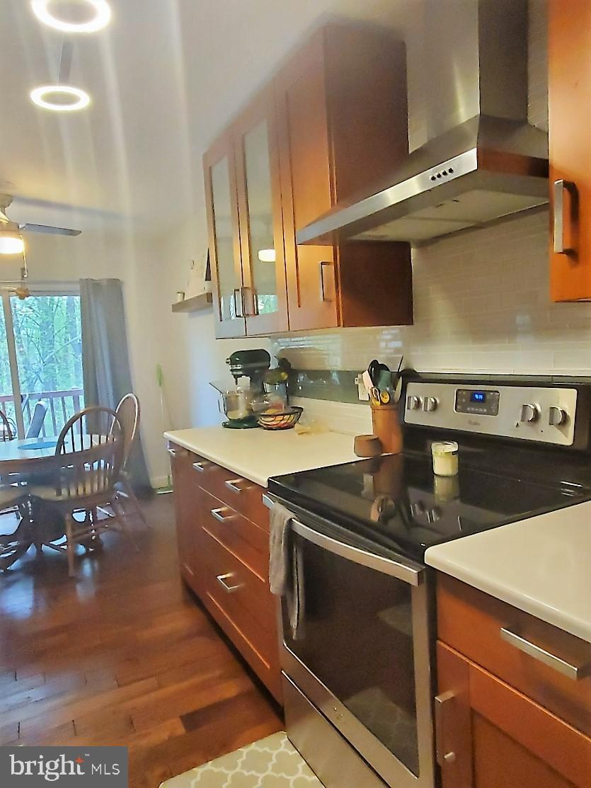 1479 Casino Circle Silver Spring, MD 20906 - Photo 4 of 24 a kitchen with a stove and a sink
