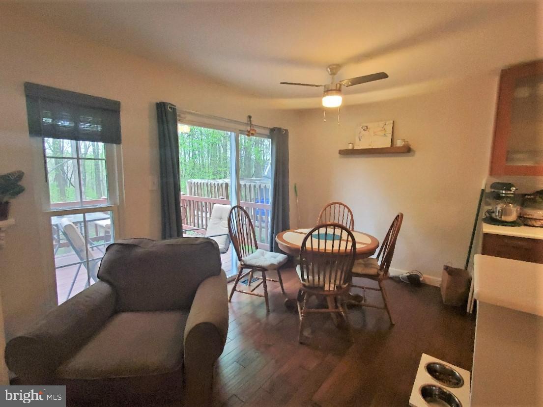 1479 Casino Circle Silver Spring, MD 20906 - Photo 6 of 24 a view of a dining room with furniture window and outside view