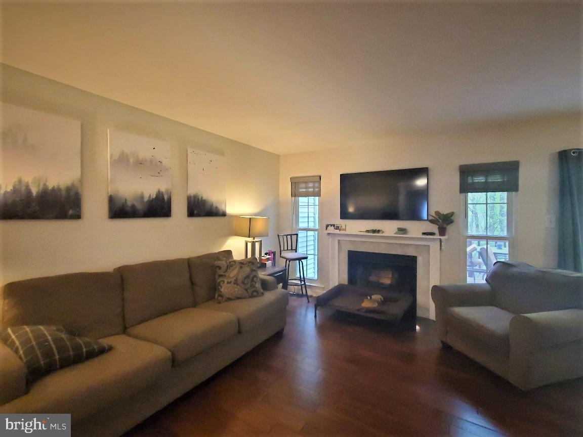 1479 Casino Circle Silver Spring, MD 20906 - Photo 9 of 24 a living room with furniture and a fireplace