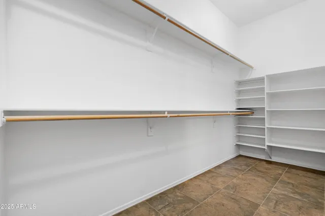 a bathroom with a tub sink and shower