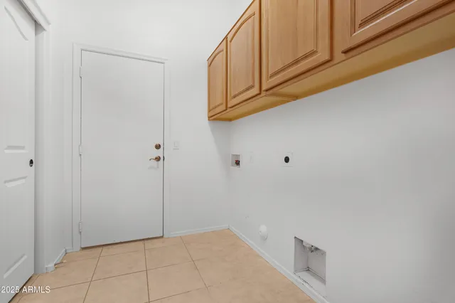 a bathroom with a sink toilet and a mirror