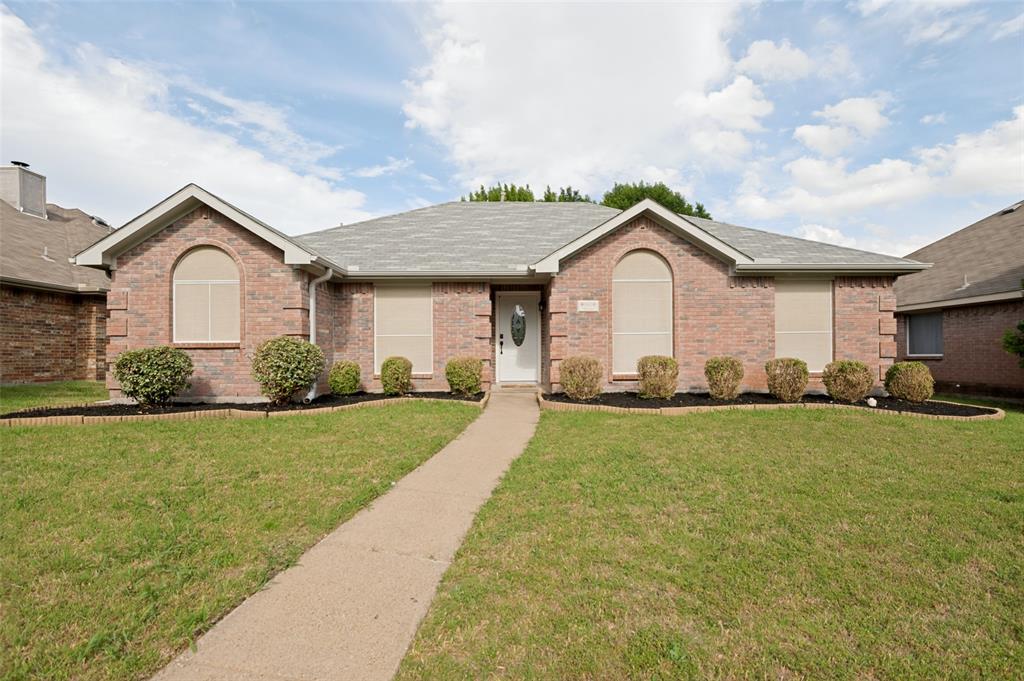 8160 Tower Road Frisco, TX 75035 - Photo 1 of 25 a house view with a garden space