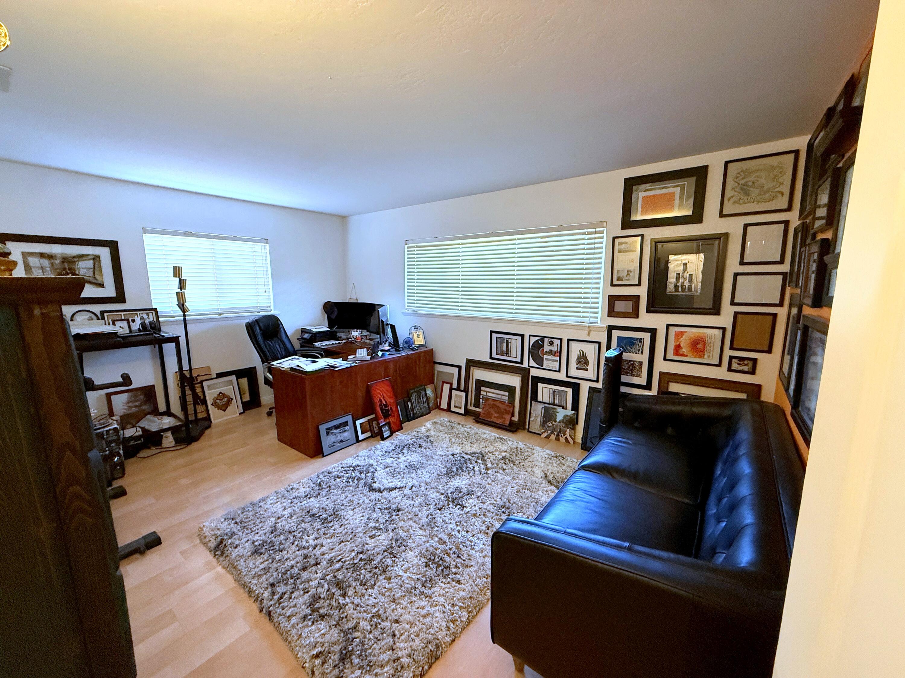 50 East Portal Street Oak View, CA 93022 - Photo 11 of 33 a living room with furniture and a flat screen tv